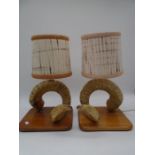 A pair of rams horn lamps
