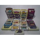 A collection of boxed die-cast vehicles including Matchbox Model of Yesteryear, Lledo Days Gone,