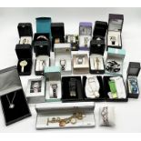 A large collection of boxed fashion watches including Joan Rivers, Marcel Drucker, Ingersoll etc.