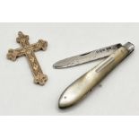 A Victorian gold coloured cross along with a silver bladed fruit knife