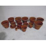 A collection of terracotta garden pots-some A/F
