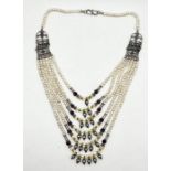 A vintage natural pearl six string necklace