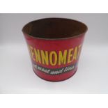 A vintage Kennoment dog food tin