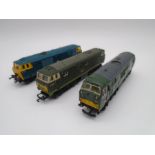 A collection of three model railway OO gauge diesel locomotives including a Hornby Tri-ang etc - all