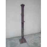 A cast iron pillar marked Hill & Smith, Brierley Hill, Height 180cm.