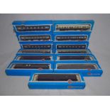 A collection of thirteen boxed various Airfix Railway System OO gauge carriages including five