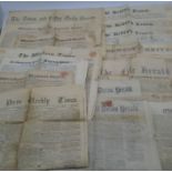 A collection of vintage newspapers including the Tiverton Gazette and East Devon Herald from 1875,