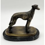 A bronze figure of a greyhound on marble base - height 19cm