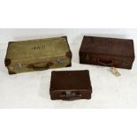 A collection of three vintage suitcases including a canvas and leather example by Papworth