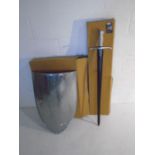 A Southern Swords cold steel sword with scabbard, along with plain steel re-enactment shield.