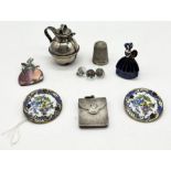 A hallmarked silver stamp case, enamelled buttons and menu holders, miniature silver Jersey jug