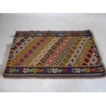 A multi coloured Kelim rug