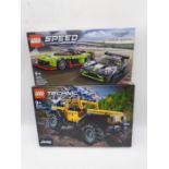 A boxed Lego Technic "Jeep Wrangler" set (42122), along with a boxed Lego Speed Champions "Aston