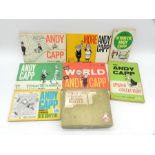 A small collection of Andy Capp books along with a jigsaw puzzle.