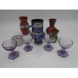 A set of four purple glasses with hexagonal bases, studio pottery, Villeroy & Boch etc.
