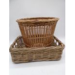 A vintage wicker basket along with a wicker tray