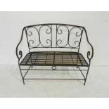 A wrought iron garden bench, length 98cm.