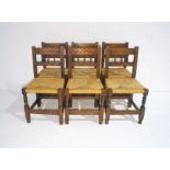 A set of six French Breton chairs with rush seats.