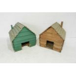 A green painted rustic wooden animal house and one other, A/F.