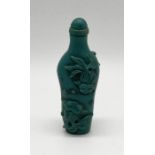 A Chinese scent bottle decorated with stylised goldfish, height 8cm