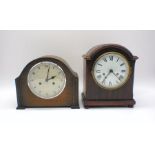 Two wooden mantle clocks.