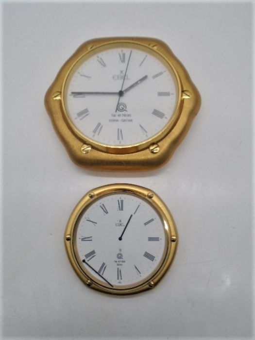 An Ebel Doha Qatar wall clock (width 17cm) plus an Ebel desk clock (width 11cm) A/F