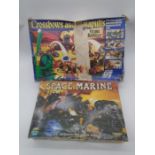 A boxed Games Workshop Warhammer 40,000 Space Marine game, along a boxed Action GT Crossbows and