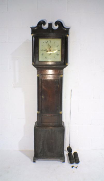 A Georgian oak longcase clock with painted dial.