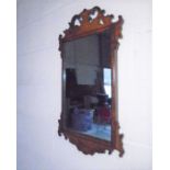 A regency wall hanging mirror.
