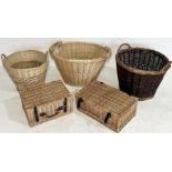 A collection of log baskets, wicker hampers etc