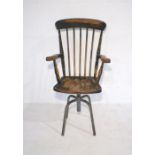 A converted Windsor chair with industrial swivel base.