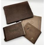 A collection of vintage photo albums, one from a WW2 army officer showing scenes of his life