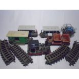 A vintage unboxed Playmobil train set including locomotive, two coaches, rolling stock power