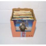 A quantity of 7" vinyl records including Iron Maiden, David Lee Roth, Fat Boys, Morris Minor and The
