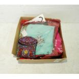 Three complete Indian saris with instructions along with two two piece Indian skirts and tops and