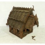 A Thai wooden spirit house - some losses, length 54cm, height 69cm, depth 86cm.