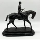 A bronze figure of horse and jockey after Bonheur on black marble base, 40cm tall