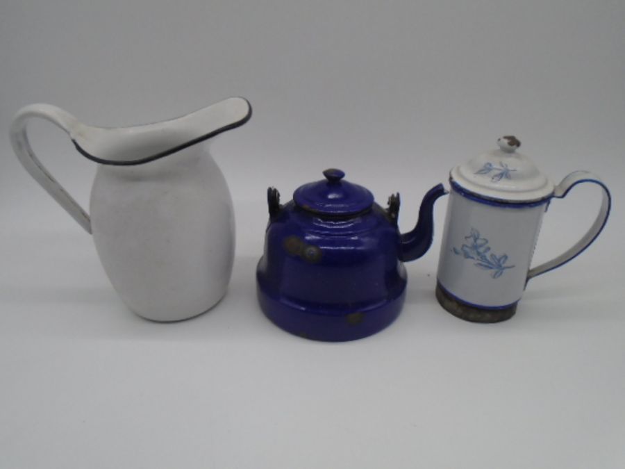 A collection of vintage kitchenalia including enamelled jugs, kettle, wooden spoons, pans, - Image 2 of 10