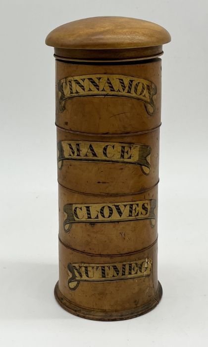 An antique treen spice tower of cylindrical form with four named sections, "Mace", "Cloves", "