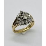 A diamond cluster ring set in 14ct gold