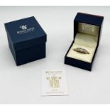 A Royal Mint DNA anniversary ring set in 9ct gold with diamonds- weight 3.9g