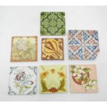 A small collection of antique tiles including a encaustic medieval style tile stamped 'TS' to