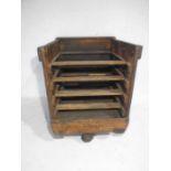 A shelved industrial wooden crate on wheels from Axminster Carpets, length 72, height 91cm & depth