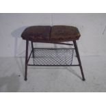 An unusual 19th century brass framed stool with two part folding red leather seat and adjustable