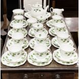 A Colclough ivy pattern part tea set including eleven trios, teapot (A/F), milk jug etc.