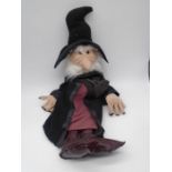 A hand puppet in the form of a wizard, made by The Puppet Company