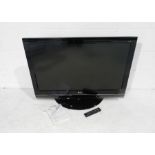 An LG 36 inch TV, model no: 37LF7700, with instructions and remote control