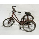 A 1950's child's "Gresham Flyer" tricycle by Aberdale Cycle Co with Dunlop seat. In need of