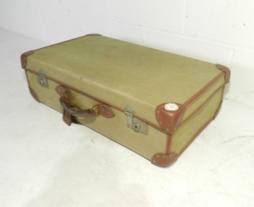 A vintage canvas and leather suitcase - Bild 2 aus 4