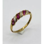 A 9ct gold ruby and diamond dress ring